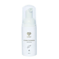 Foam cleanser bottle with 'Lovely' branding on a white background
