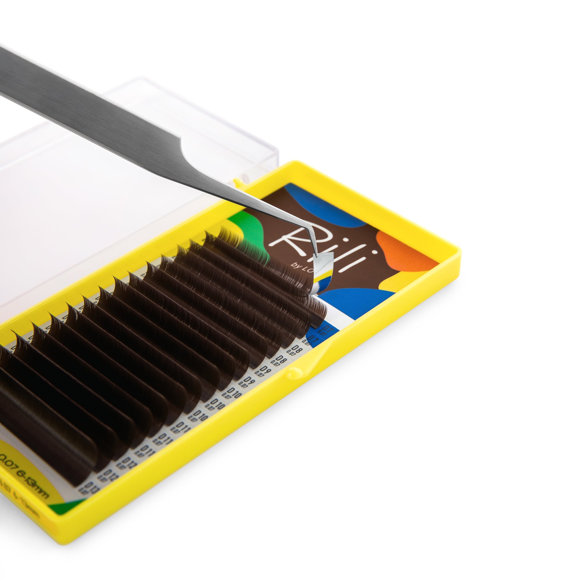 Close-up of Rili Choco brown lash extensions showing rich chocolate color and premium Korean fiber quality